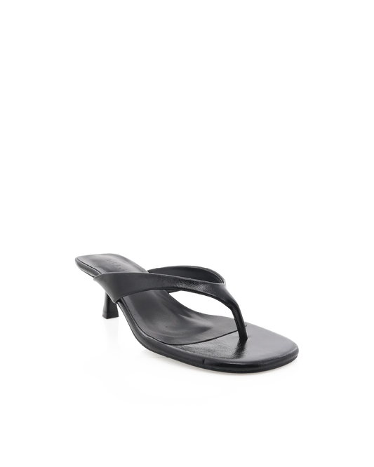 A pair of black stiletto thong sandals with straps.