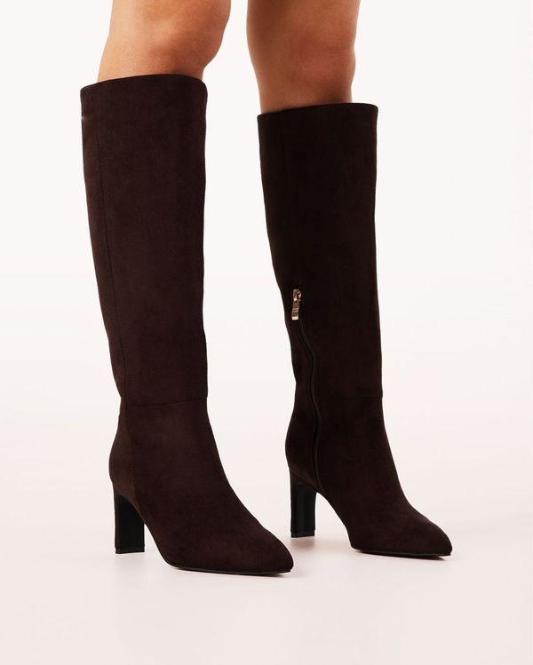 Chocolate brown suede knee-high boots with a pointed toe and high heel.