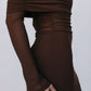 Brown dress with long sleeves and a fitted waist on a white background